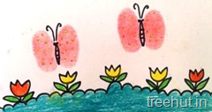kids thumb printing butterfly craft